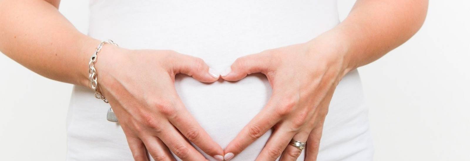 Pregnant love with hands.jpg